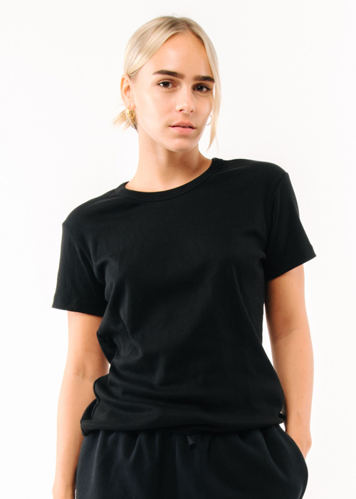 blond-woman-in-black-basic-shirt